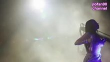 Nicki Minaj showing her tits on stage.