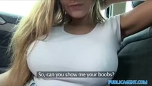 Cute blonde in car shows off her big boobs with stiff nipples