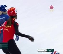 Chinese skater couldn't resist with Elise Christie in front of her.