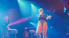 Niykee Heaton wearing a sexy outfit onstage