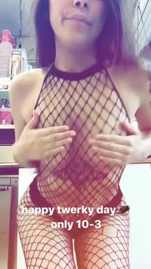Shaking her ass in fishnets