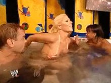 Torrie gets out of the jacuzzi