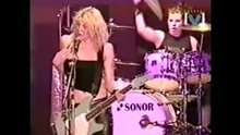Courtney Love rocking out with her tits out