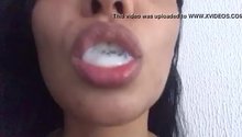 Hot brunette plays with and swallows cum