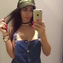 Girl masturbates with a dildo in the dressing room