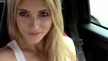 Hot blonde in a car with her pink dildo