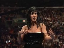 Miss Kitty showing her tits to the WWF audience